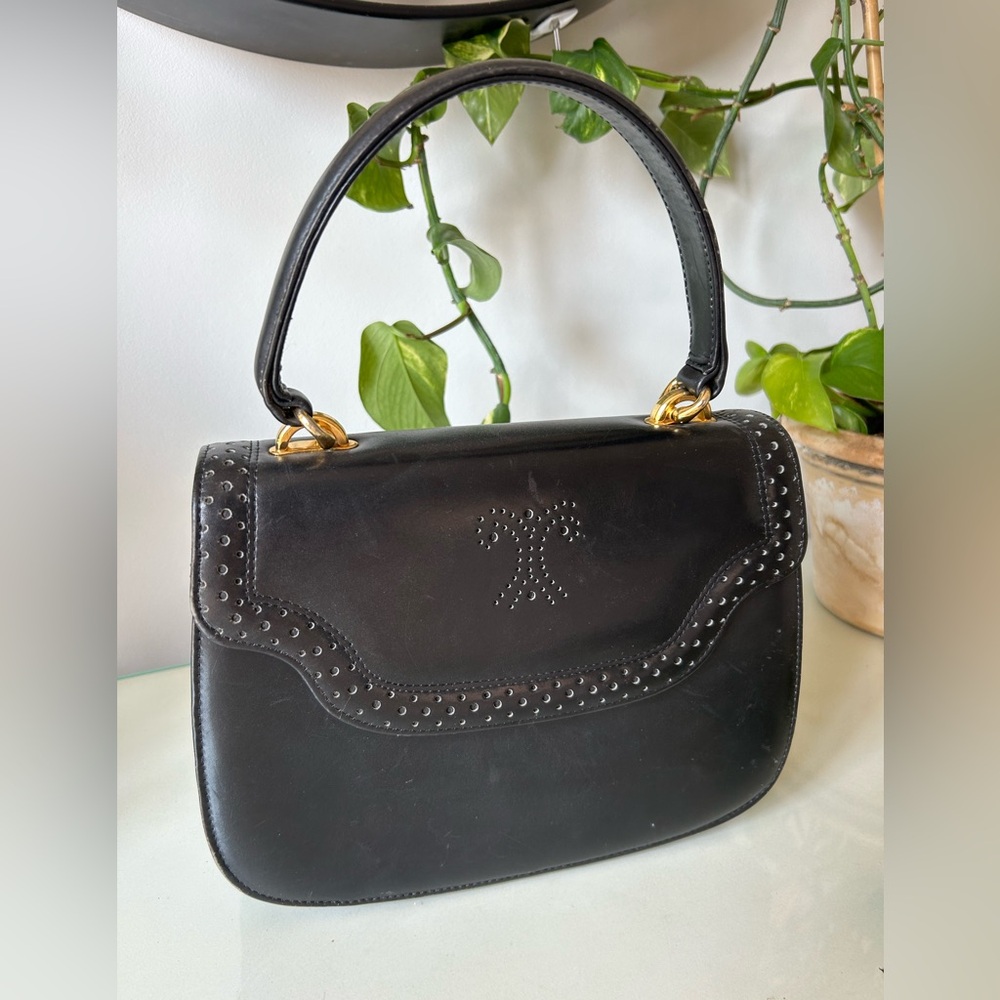 Vintage black top handle bag with gold hardware